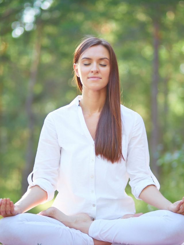 concentrated-woman-meditating-nature