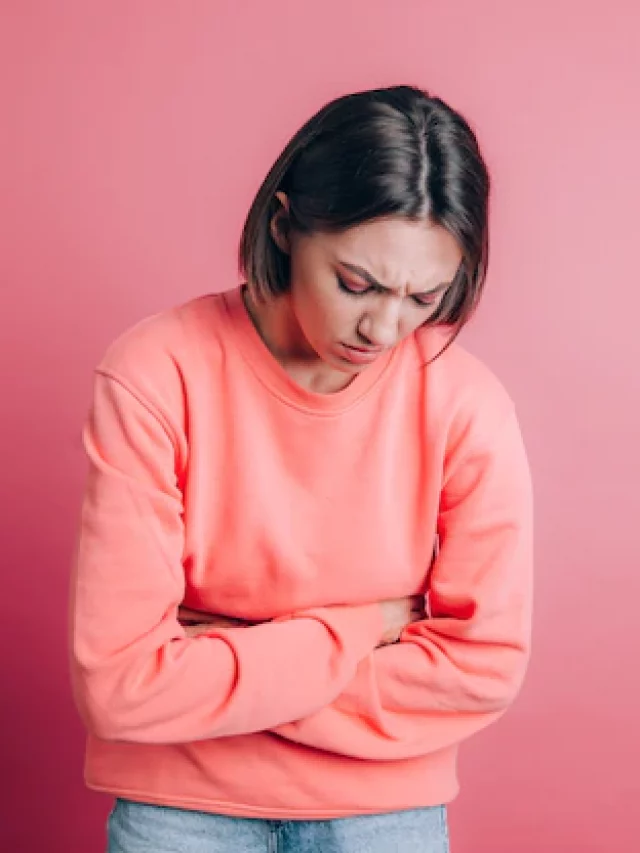 woman-wearing-casual-sweater-background-suffering-stomach-ache-with-painful-grimace-feeling-sudden-period-cramps-gynecology-concept_343596-4024